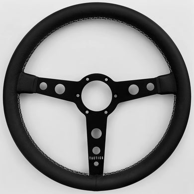 Flat steering wheel in leather with crossed stitching 