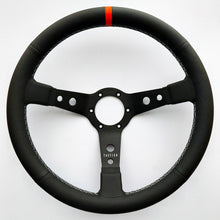 Custom steering wheel in black aluminum with air-cooled leather by Tactico Racing Atelier