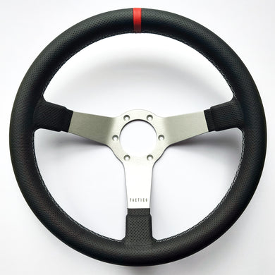 Custom steering wheel with perforated leather by Tactico Racing Atelier